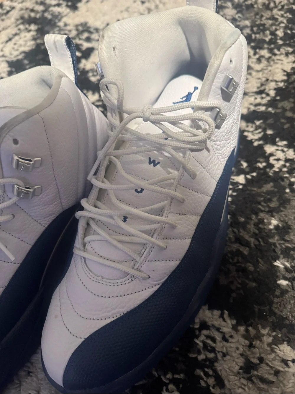 Jordan 12s White and Navy Sneakers